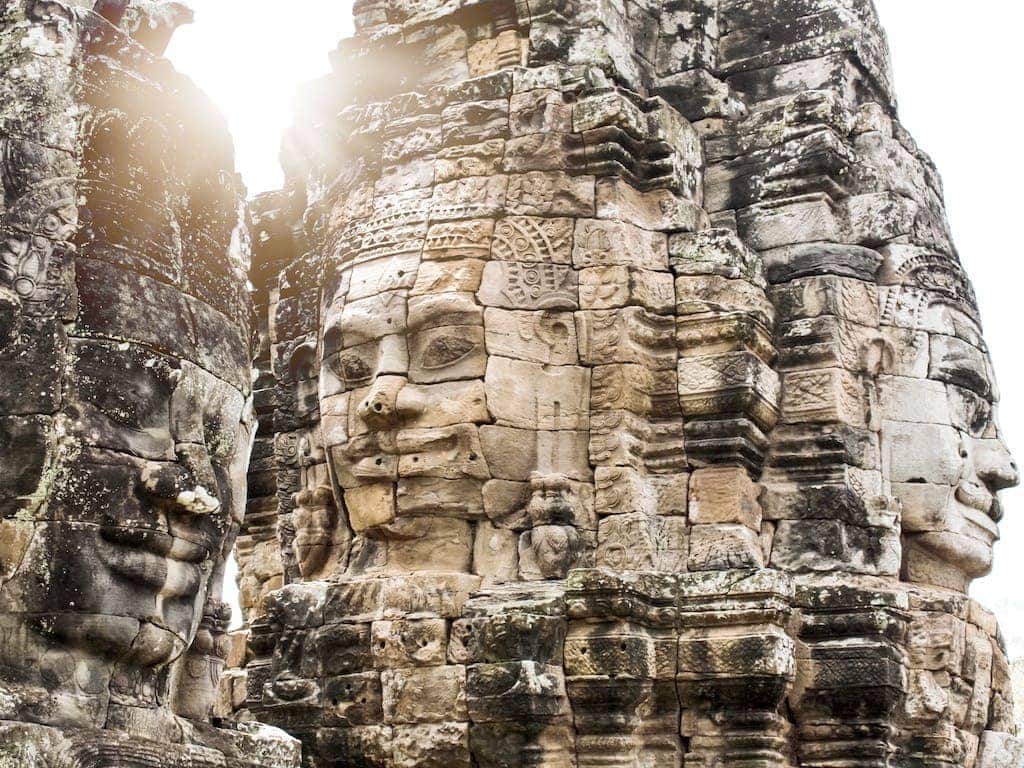 Stone faces carved into the Bayon temple near Siem Reap, Cambodia